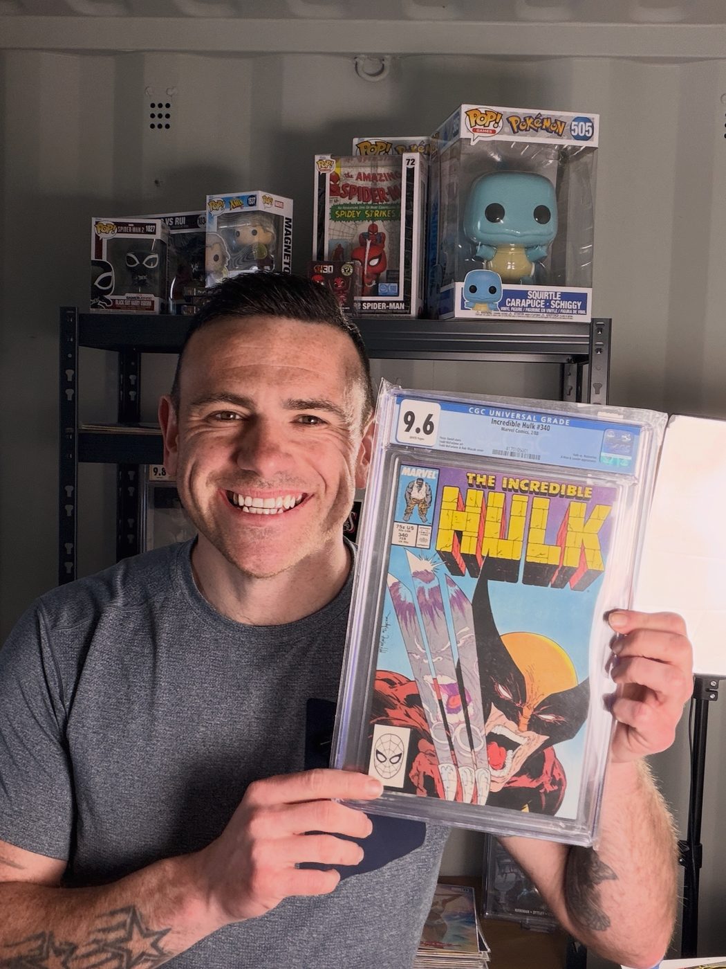Lee from Retro Relics Comics holding a CGC 9.6 graded Incredible Hulk #340